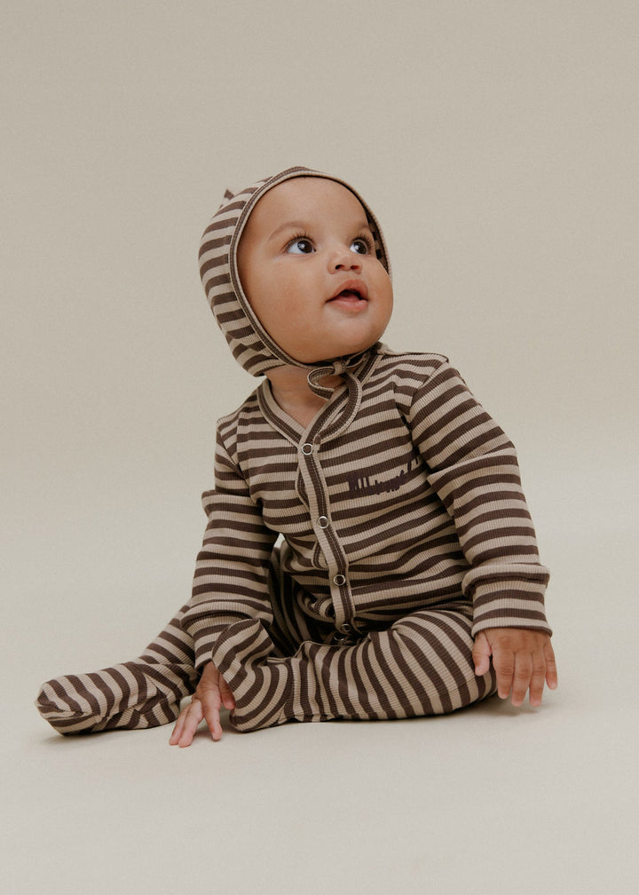 Baby wearing Acorn Stripe onesie